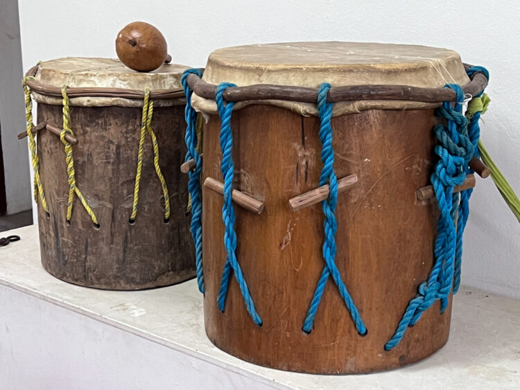 two drums side by side, one larger