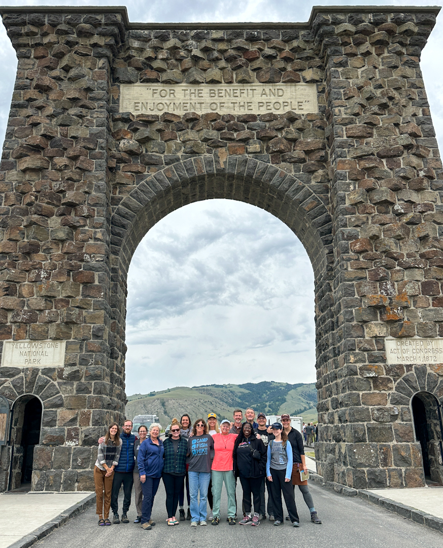 group standing in the Roosevelt Arch