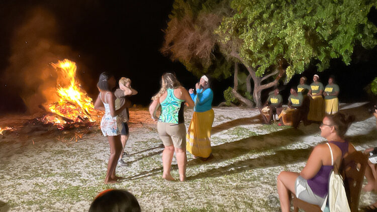 Dancers in front of bonfire