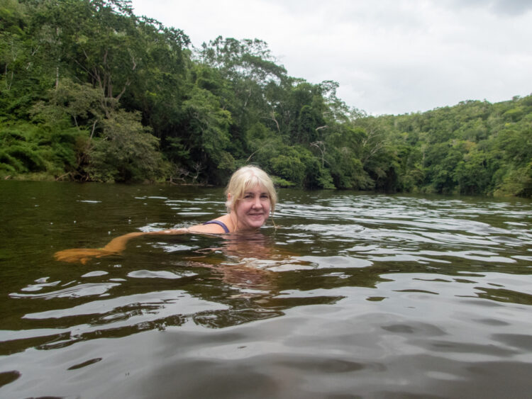 woman swimming in river