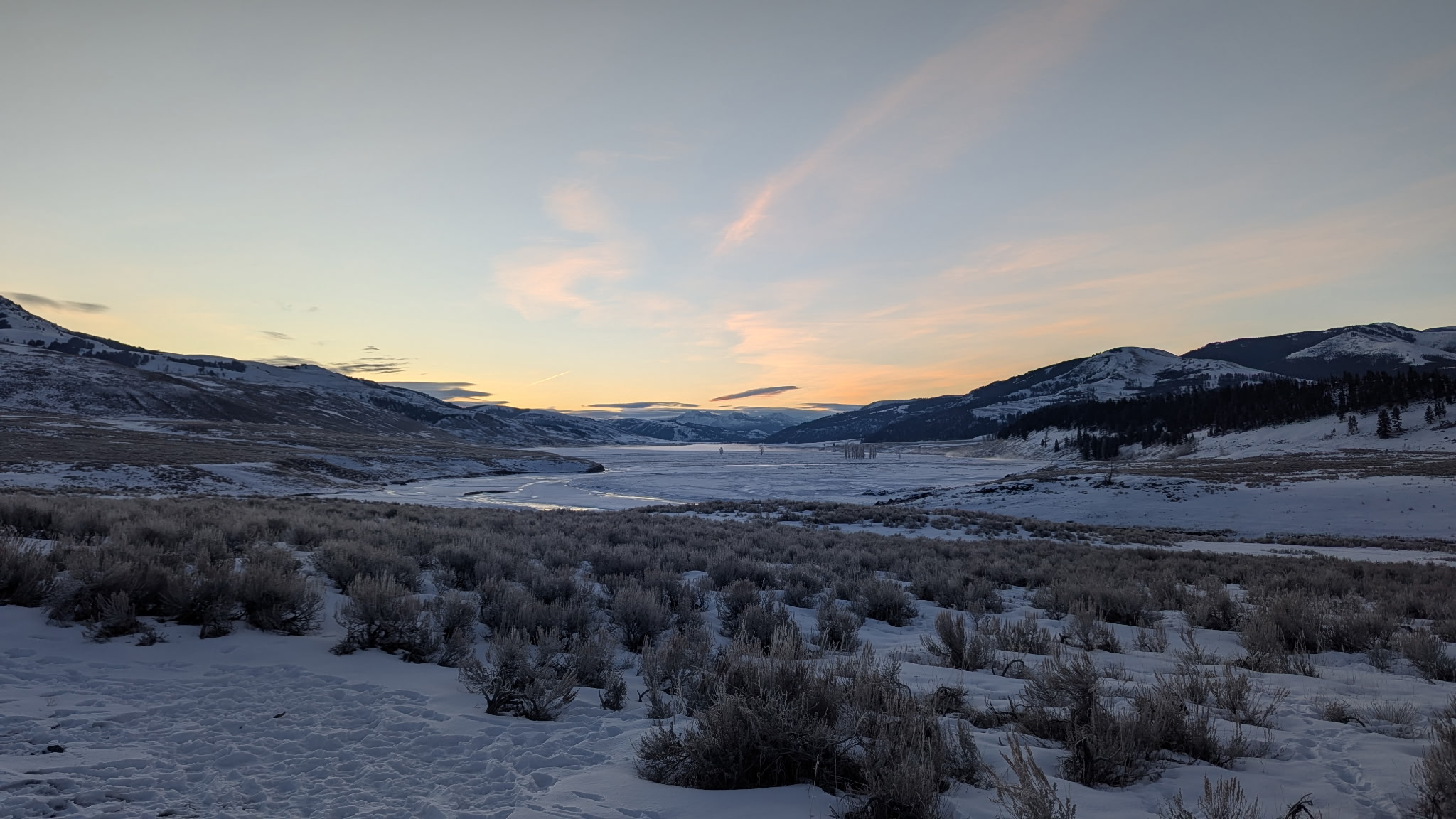 sunrise over snowy landscape